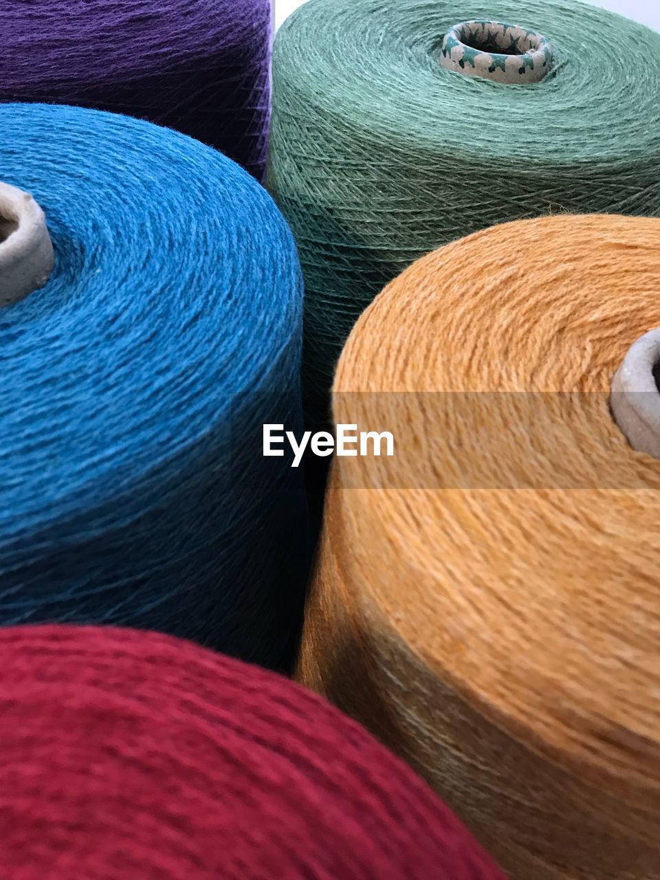 Full frame shot of colorful spools in store