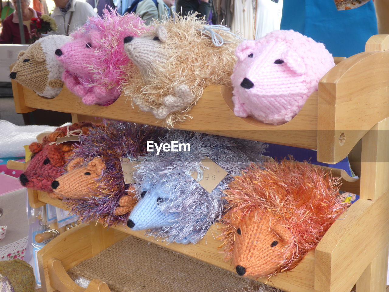 CLOSE-UP OF TOYS FOR SALE IN MARKET STALL