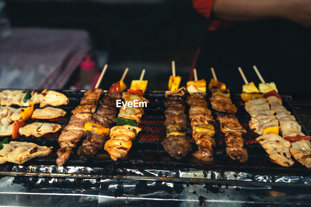 Close-up of meat on barbecue grill