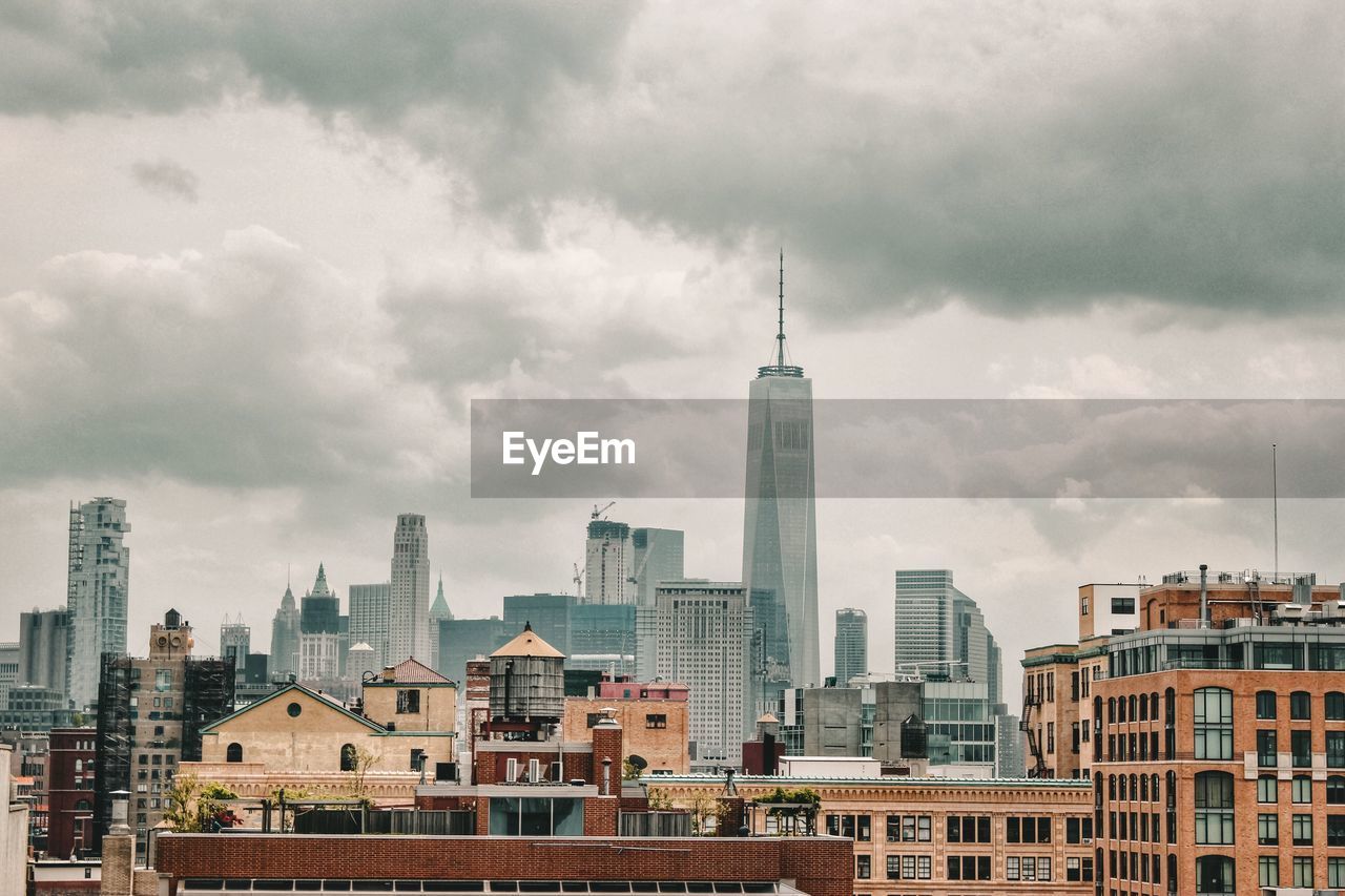 Modern buildings in city against sky