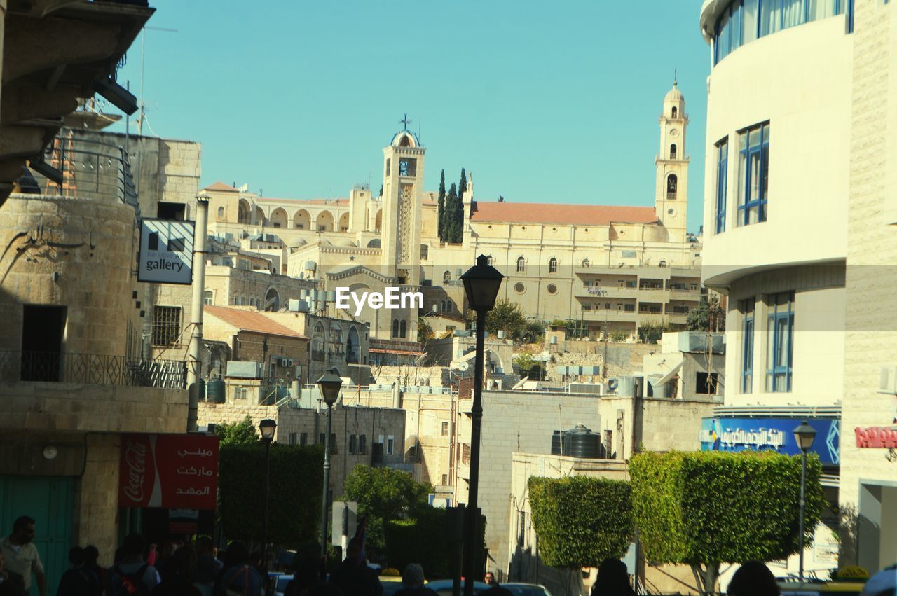 PANORAMIC VIEW OF PEOPLE IN CITY