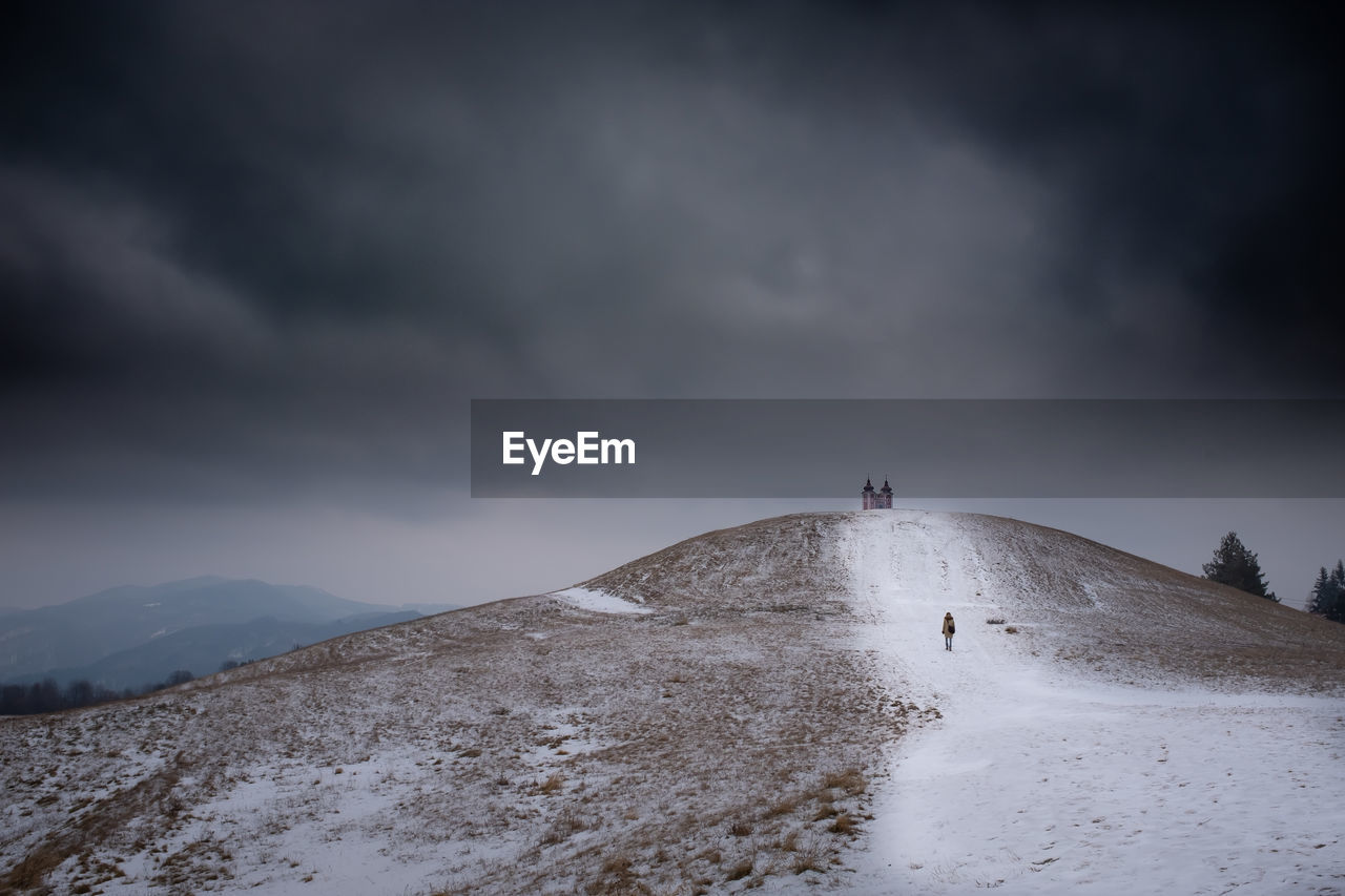 scenic view of snow covered mountain against sky