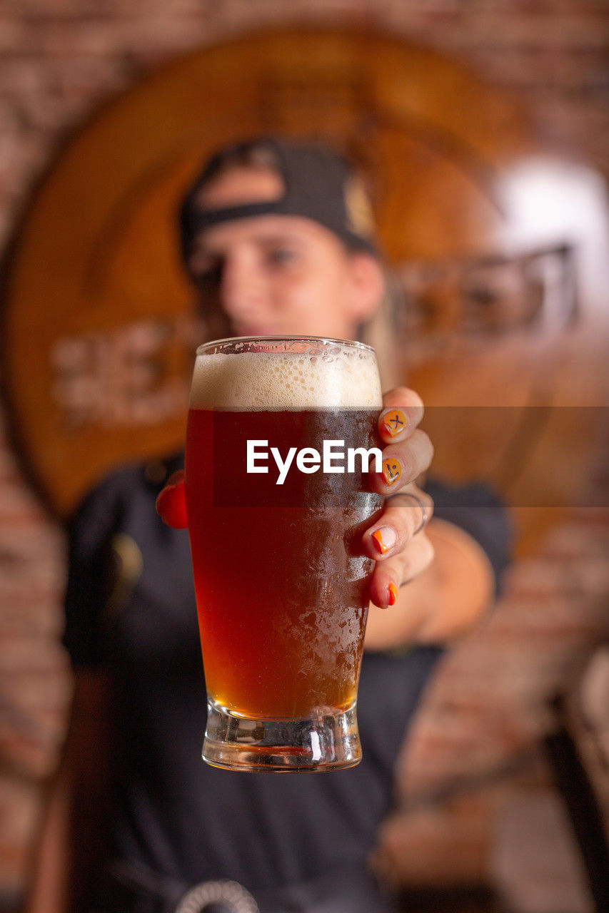 Close-up of beer glass on table