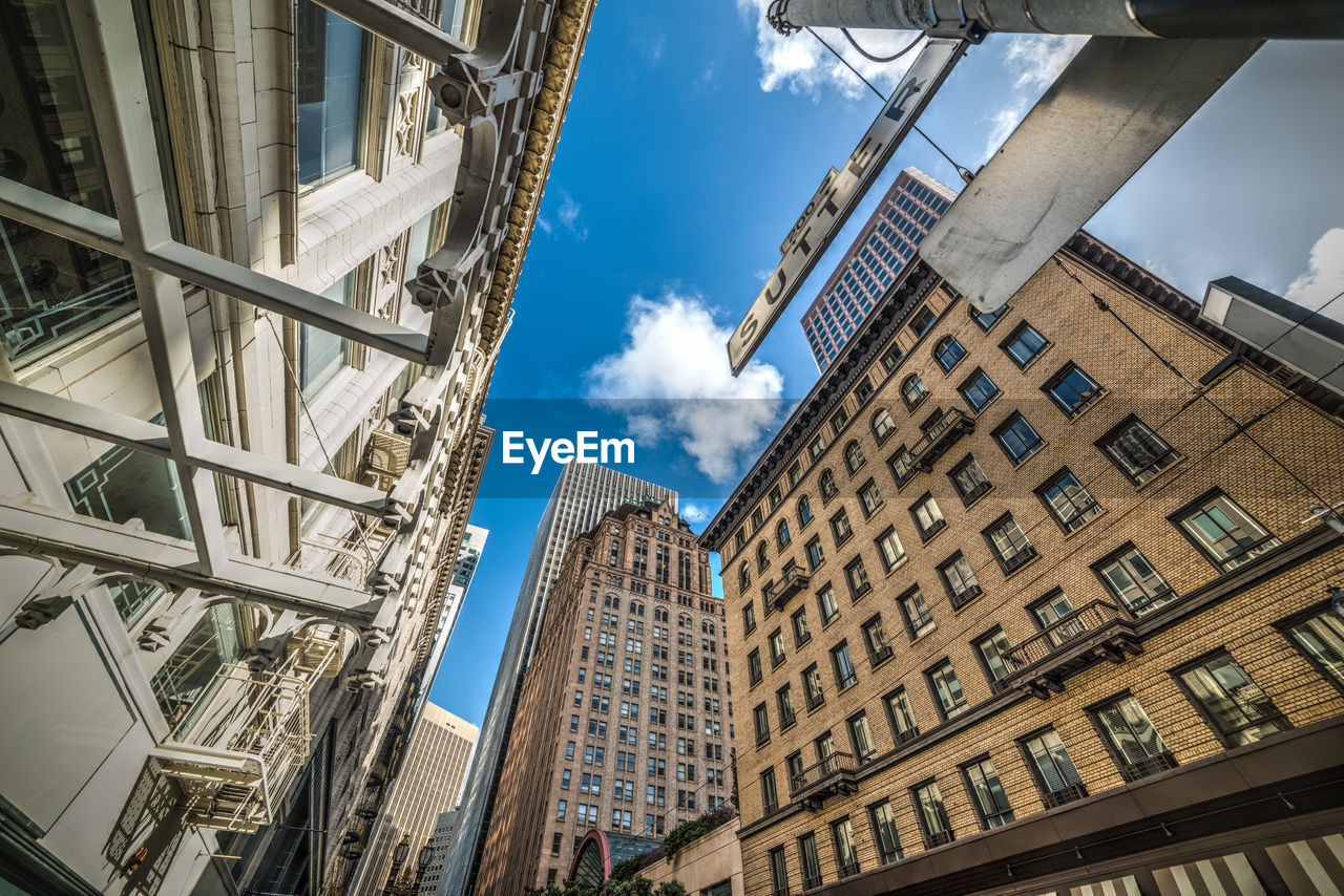 LOW ANGLE VIEW OF BUILDING AGAINST SKY