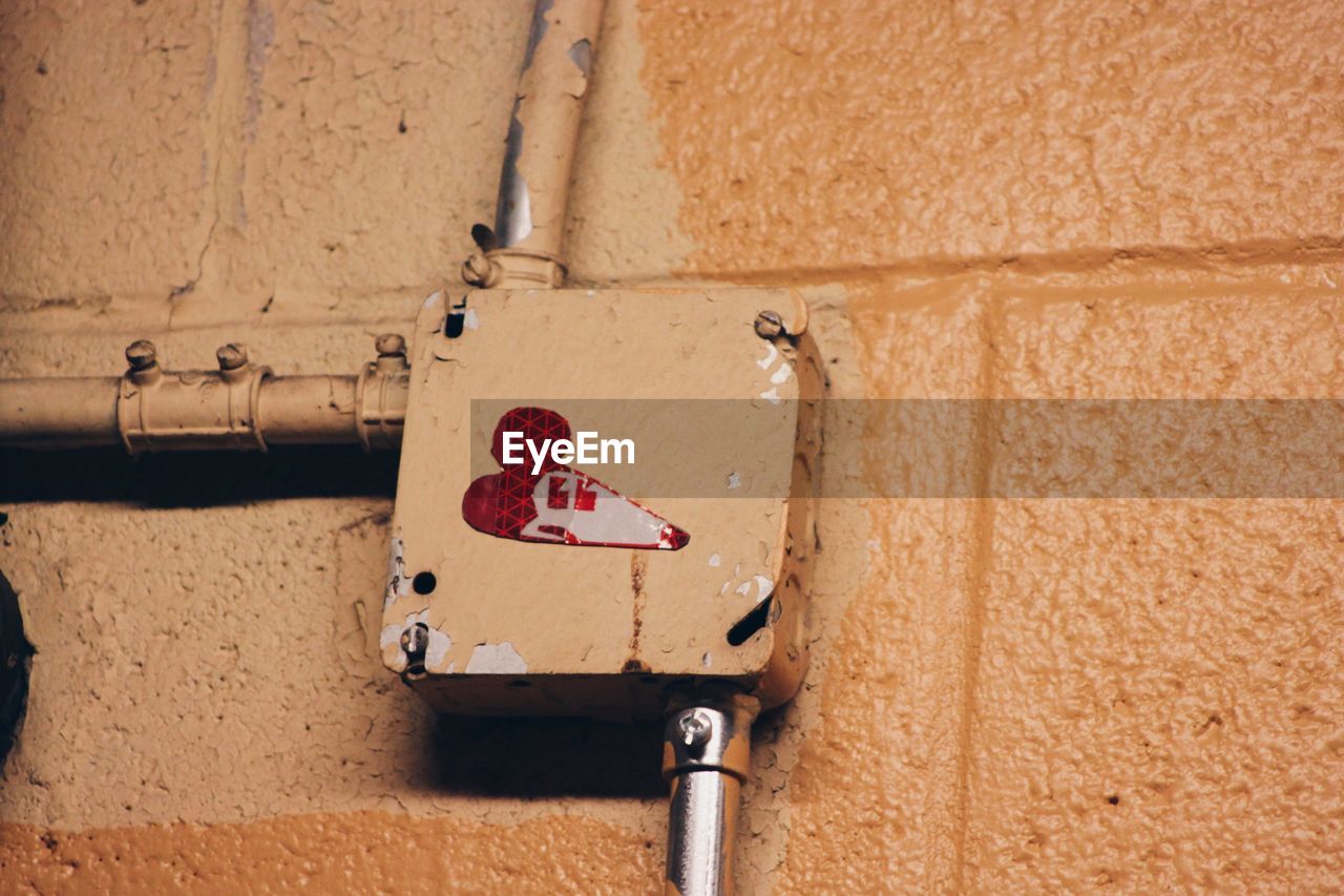 CLOSE-UP OF RED PIPE