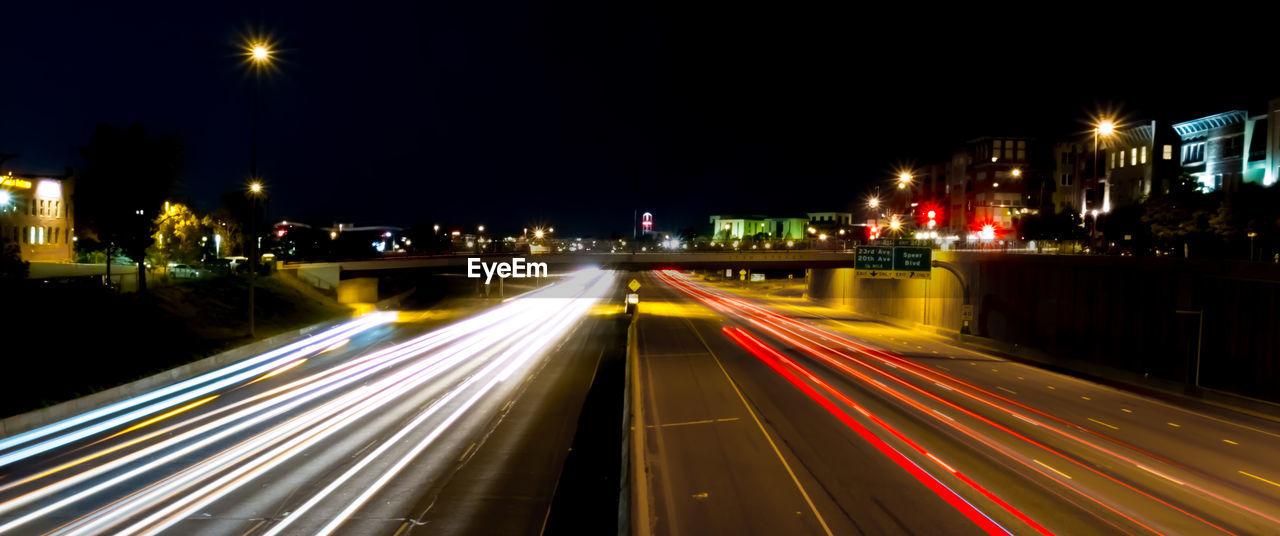 Light trails on road at night