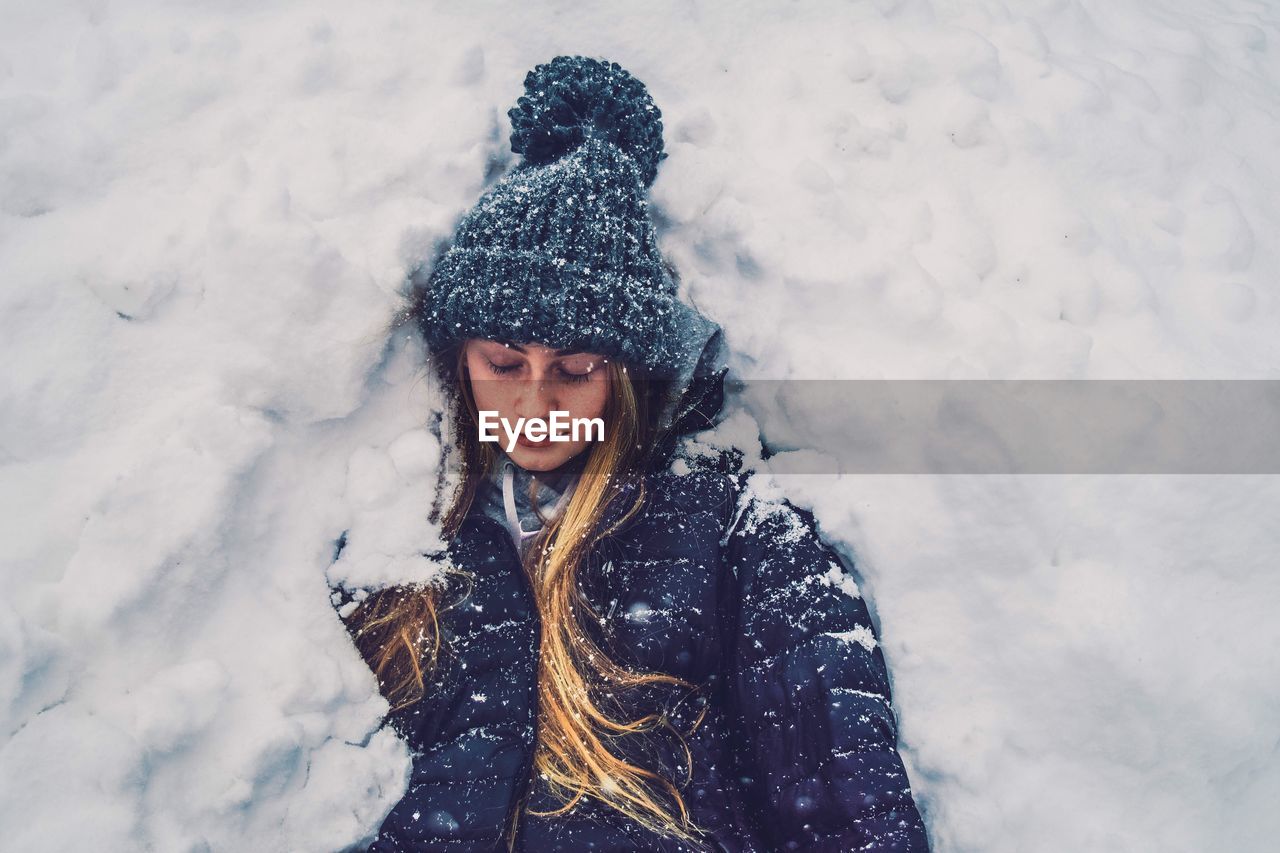 Portrait of woman in snow