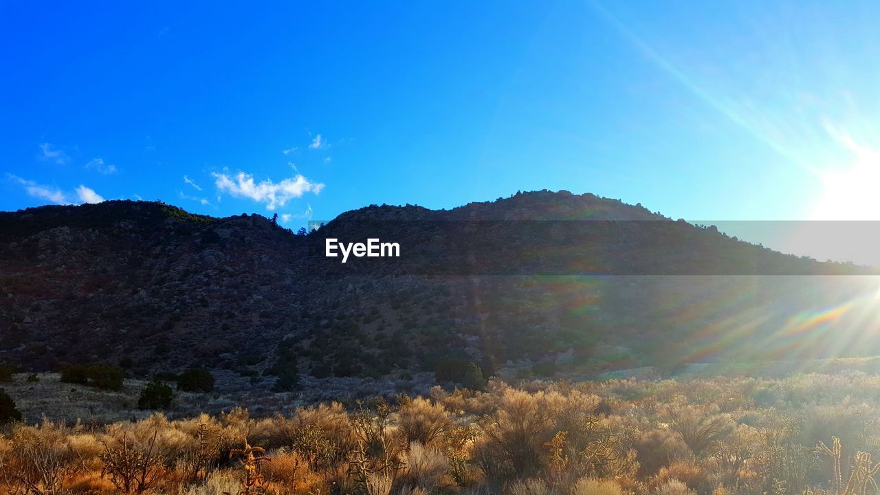 MOUNTAIN AGAINST CLEAR BLUE SKY