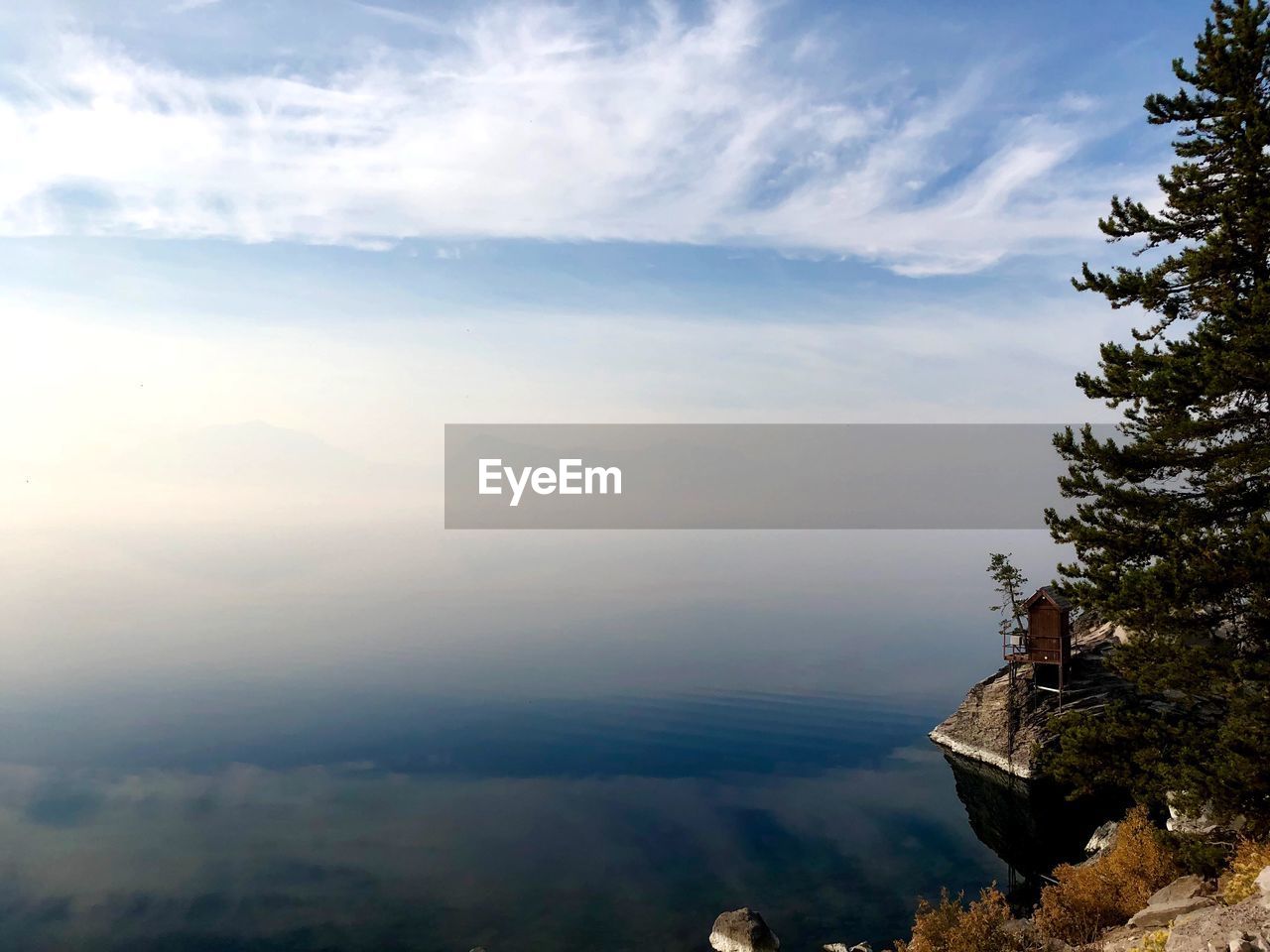 SCENIC VIEW OF TREE MOUNTAINS AGAINST SKY