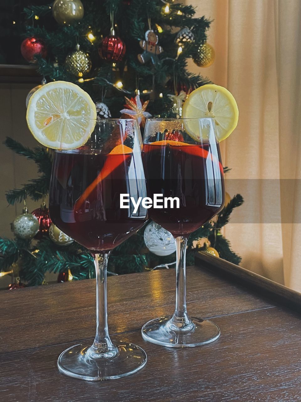 CHRISTMAS DECORATIONS ON TABLE AT HOME DURING NIGHT