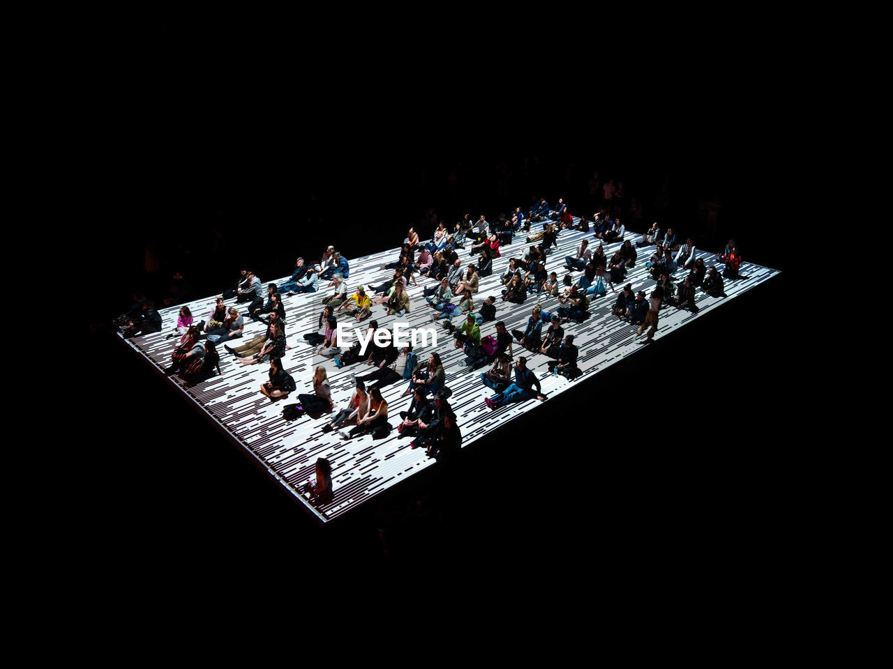 HIGH ANGLE VIEW OF ILLUMINATED CHESS ON TABLE