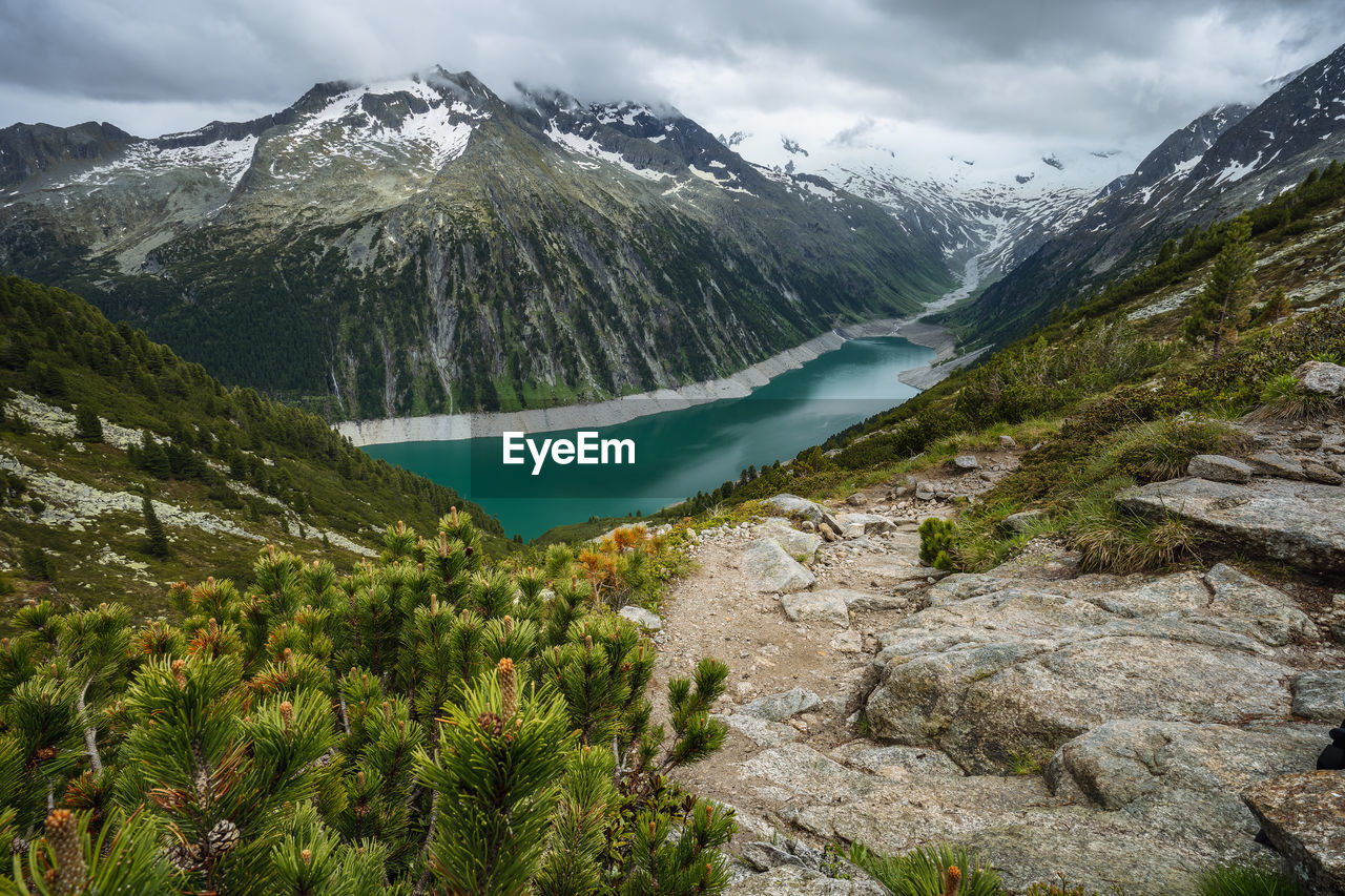 Schlegeis stausee lake view from mountain hiking path trail. zillertal, austria, europe