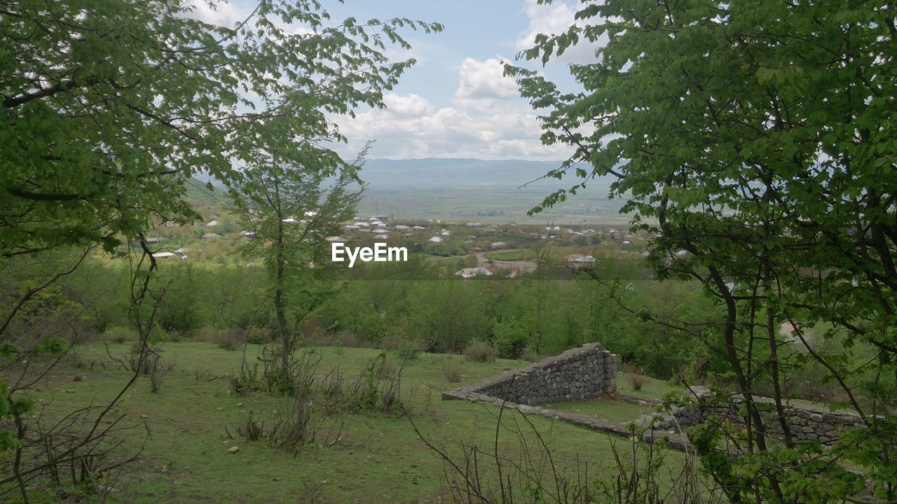 SCENIC VIEW OF LANDSCAPE AGAINST SKY DURING AUTUMN