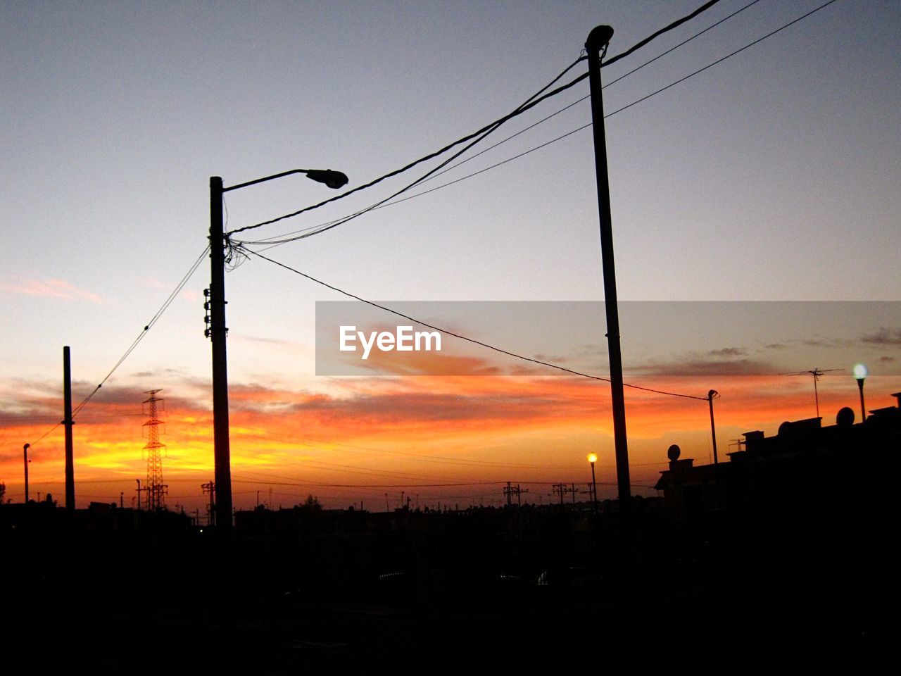 View of silhouette landscape at sunset