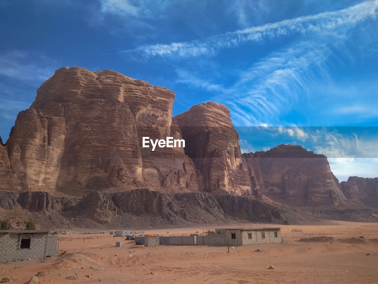 SCENIC VIEW OF ROCK FORMATIONS IN DESERT