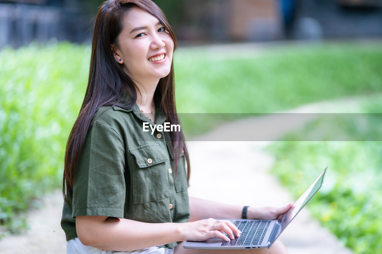 young woman using mobile phone