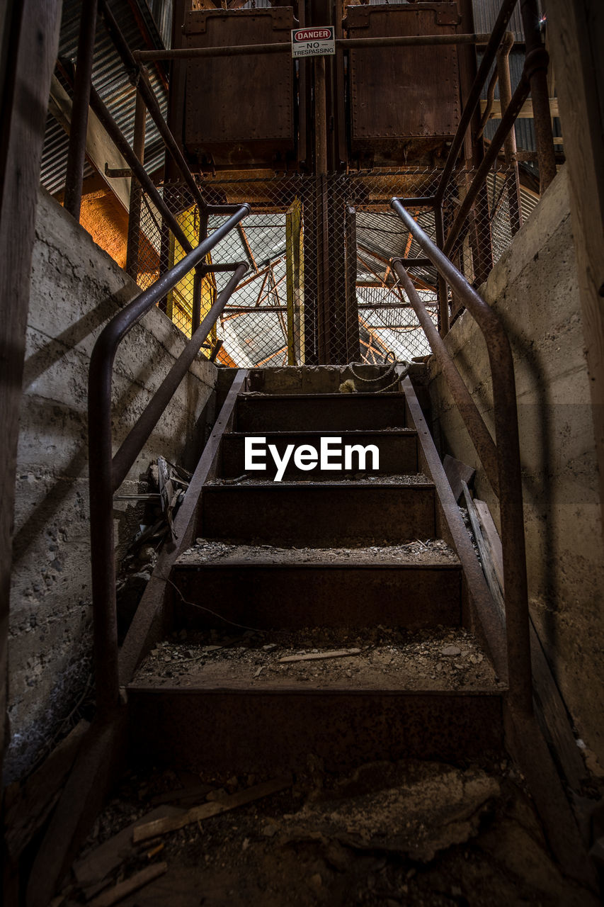 View of steps in abandoned factory