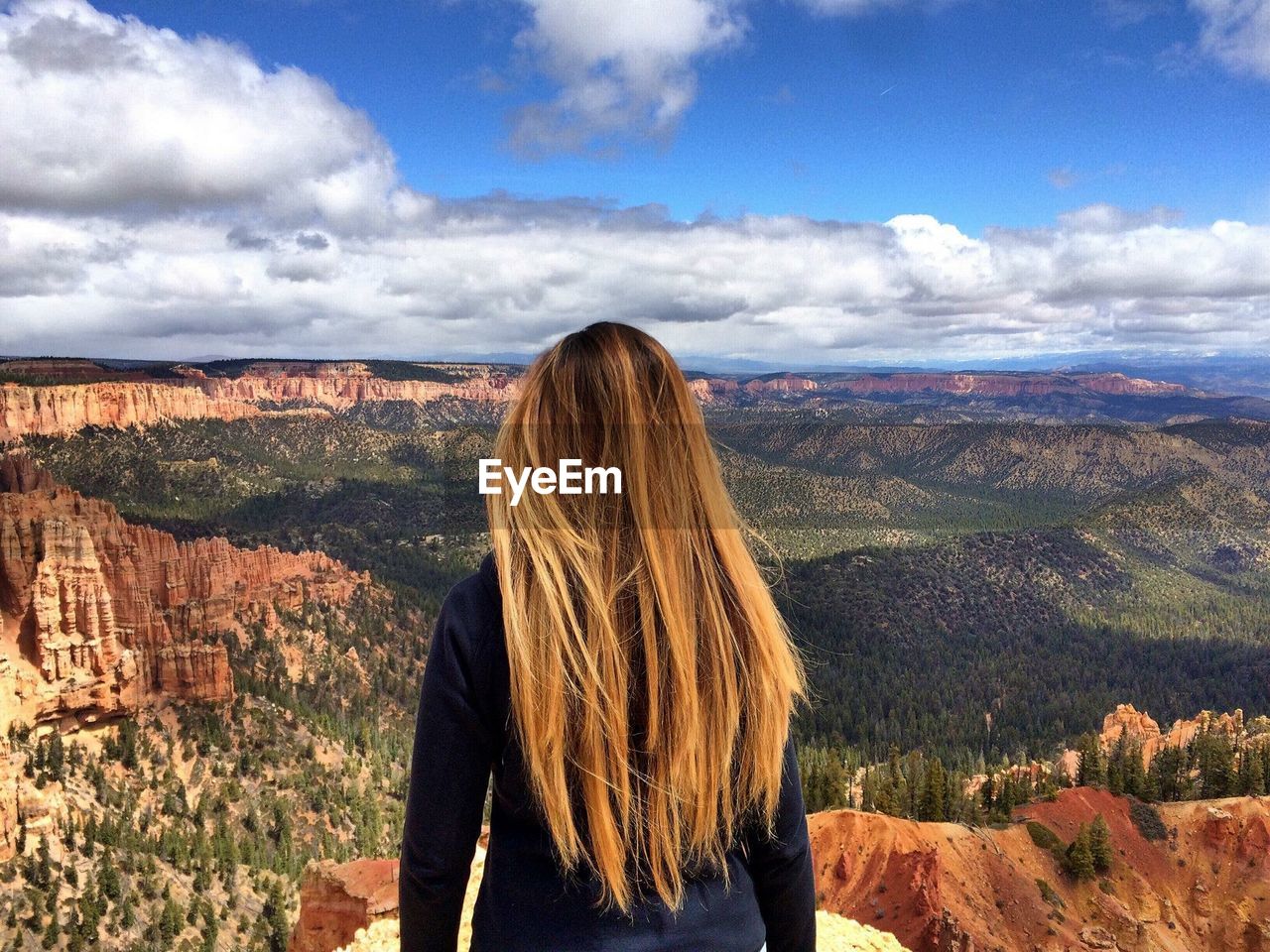 Rear view of woman against sky at bryce canyon national park