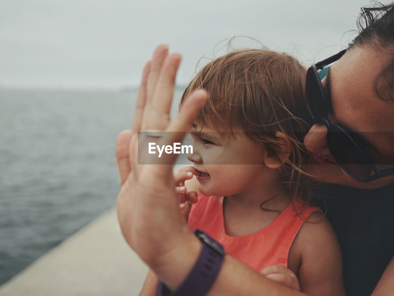 Mother and daughter at seaside