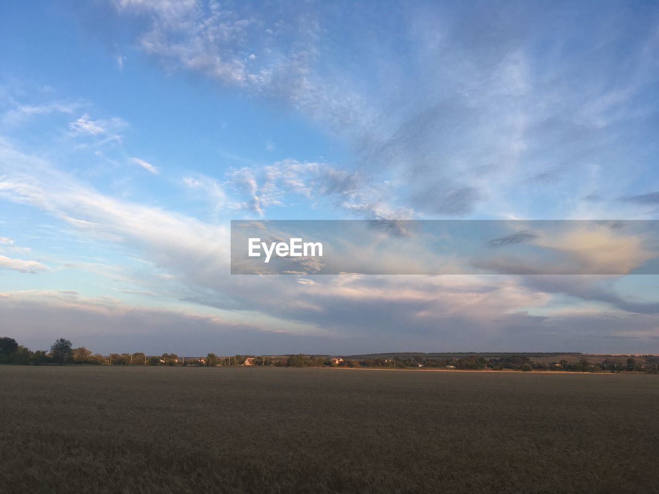 SCENIC VIEW OF FARM AGAINST SKY