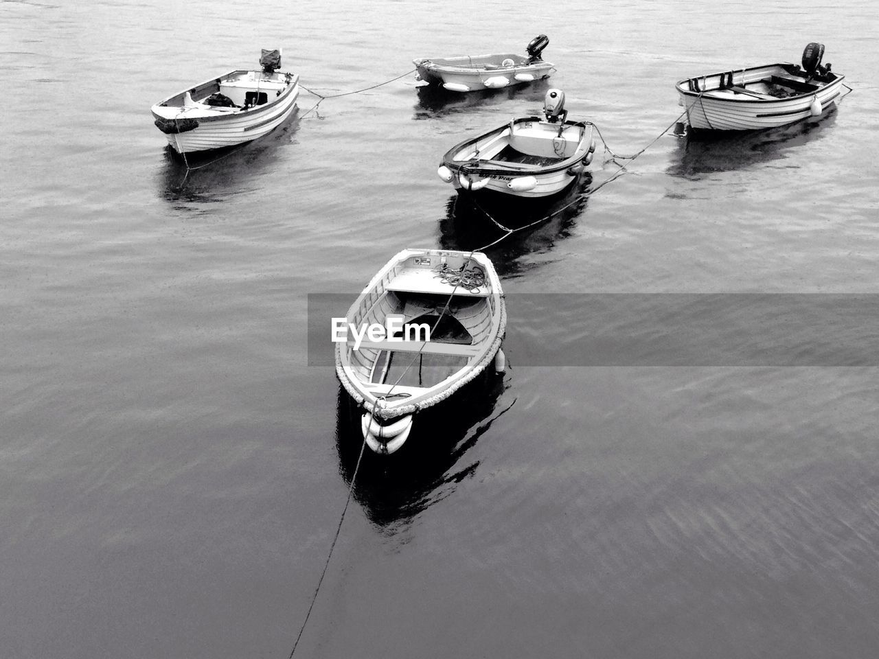 Moored motorboats on river