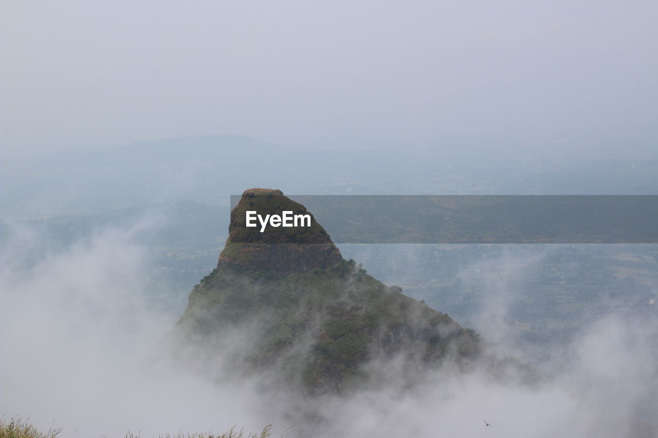 MOUNTAIN AGAINST SKY