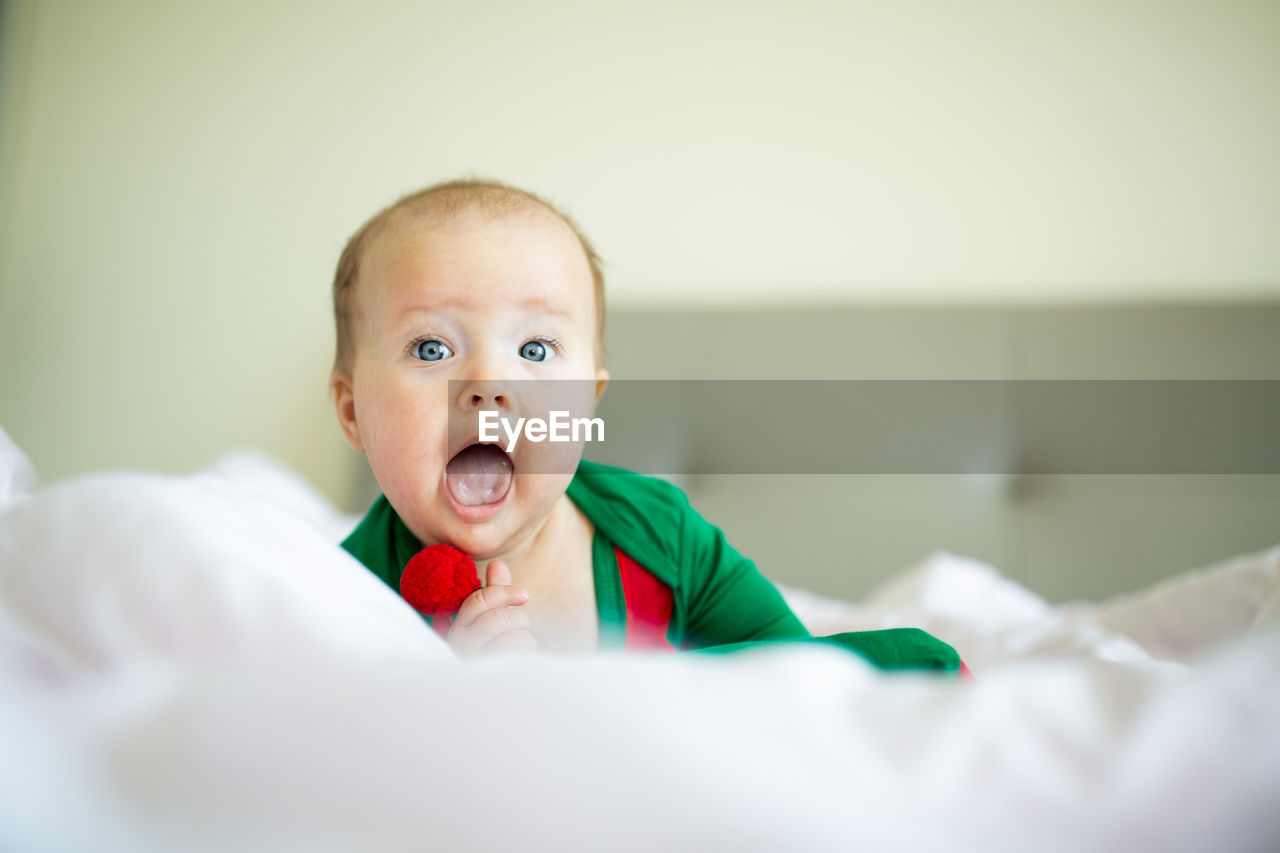 portrait of cute baby boy at home