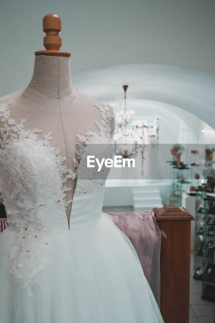 Close-up of mannequin with wedding dress