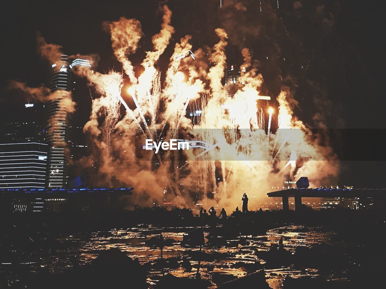 PANORAMIC VIEW OF FIREWORKS AT NIGHT