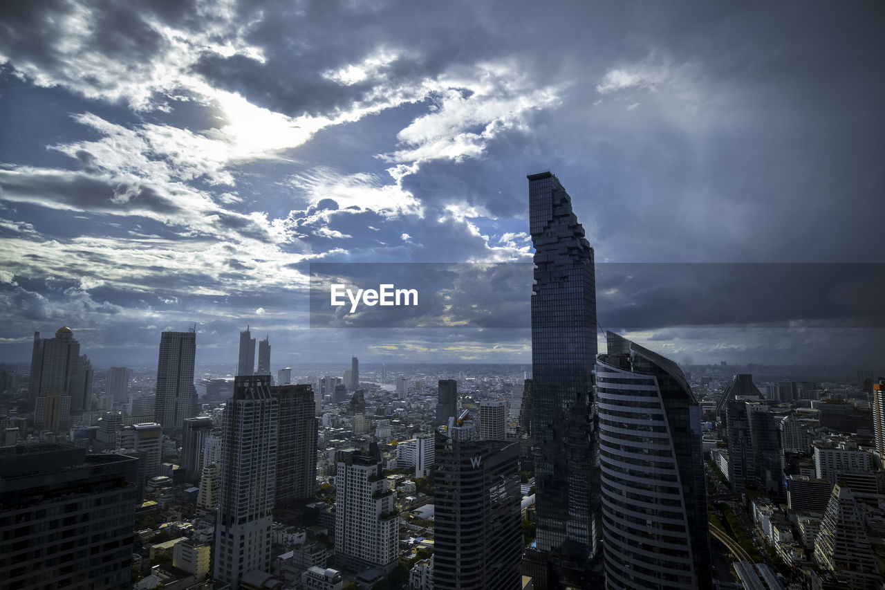 Modern buildings in city against sky