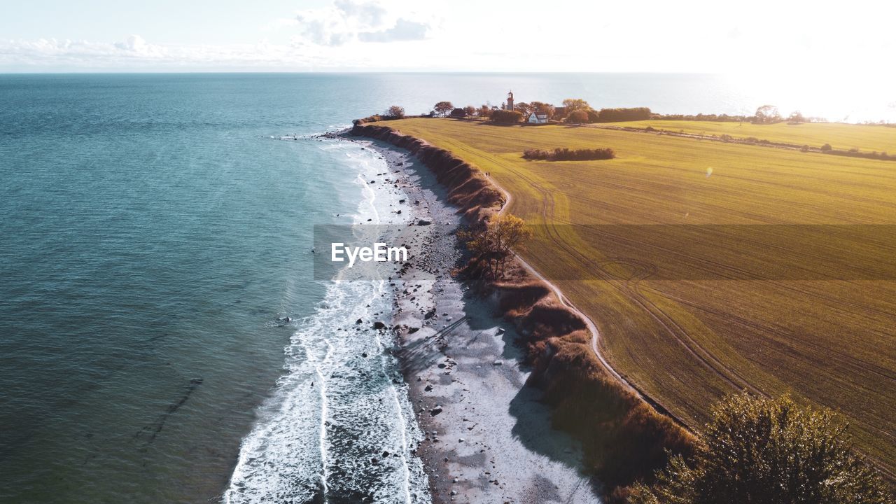 Scenic drone view of sea against sky