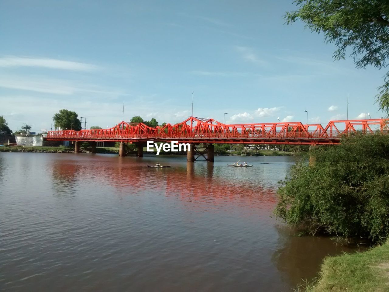 Bridge over river against sky