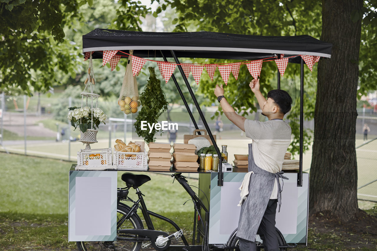 Man at food stall