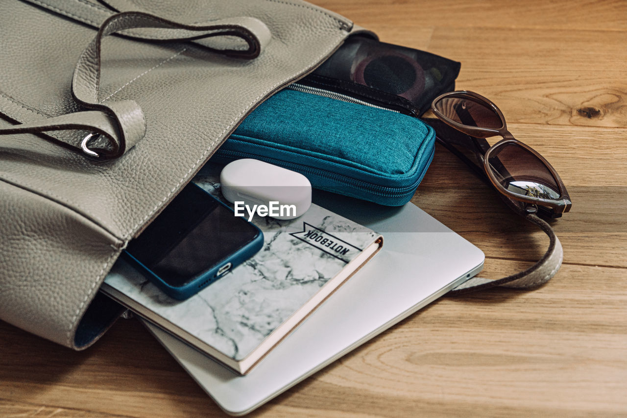 directly above shot of personal accessories on table