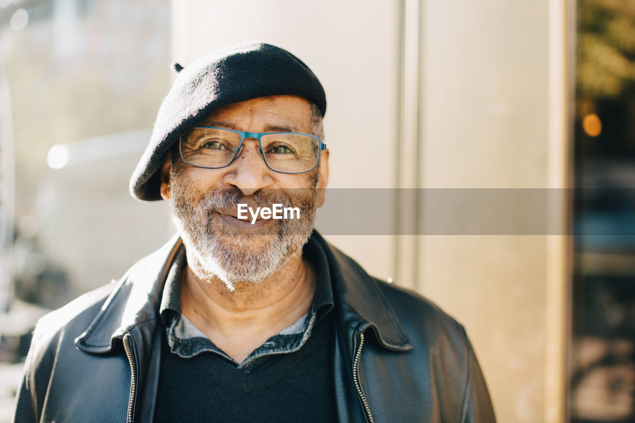 Portrait of smiling senior man with eyeglasses