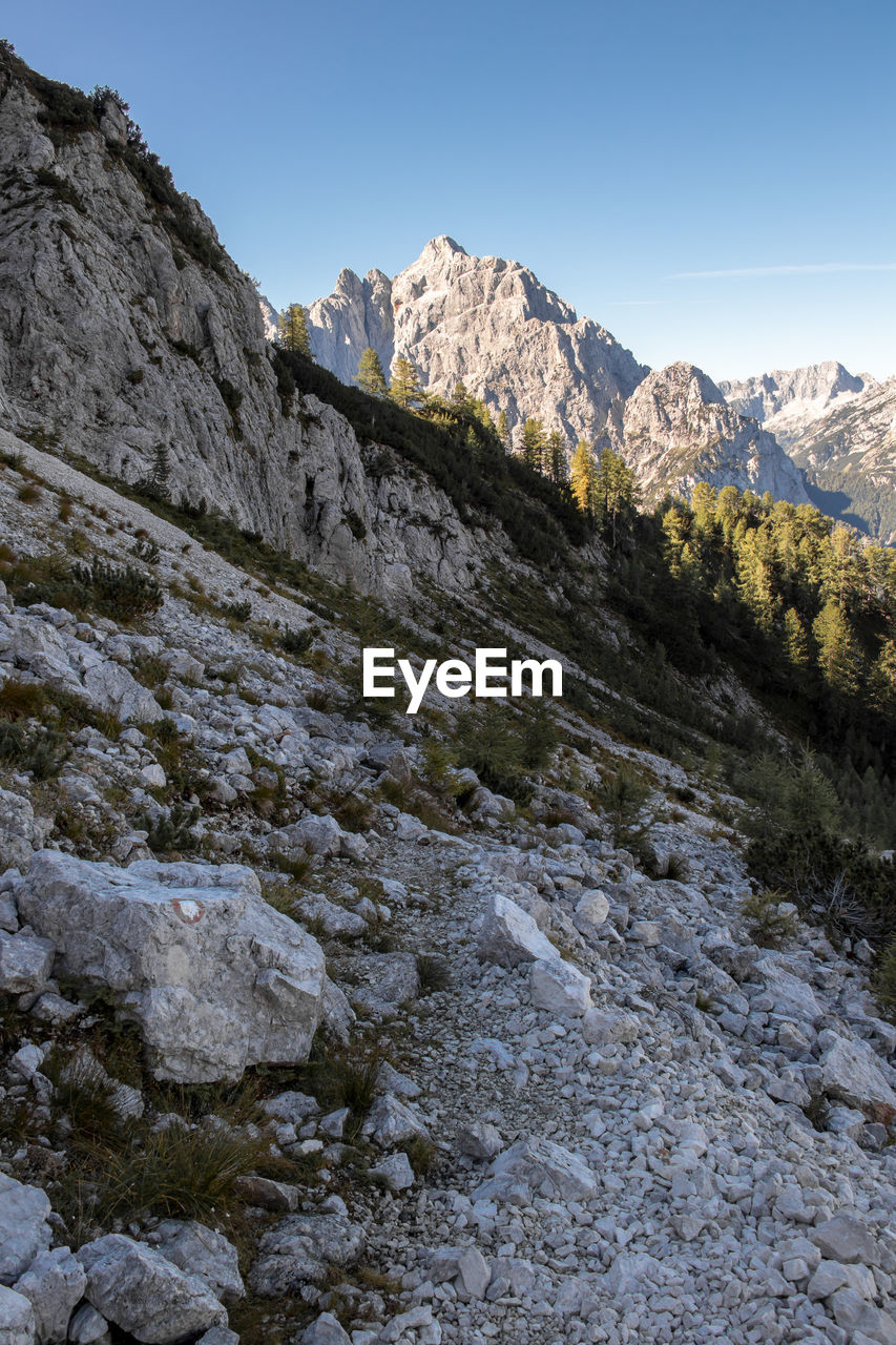 Scenic view of rocky mountains against clear sky