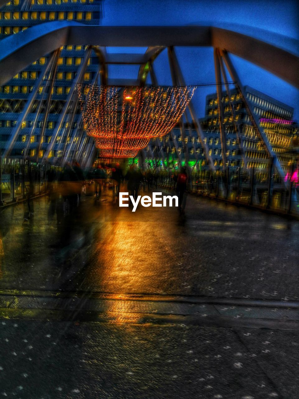 PEOPLE AT ILLUMINATED NIGHT