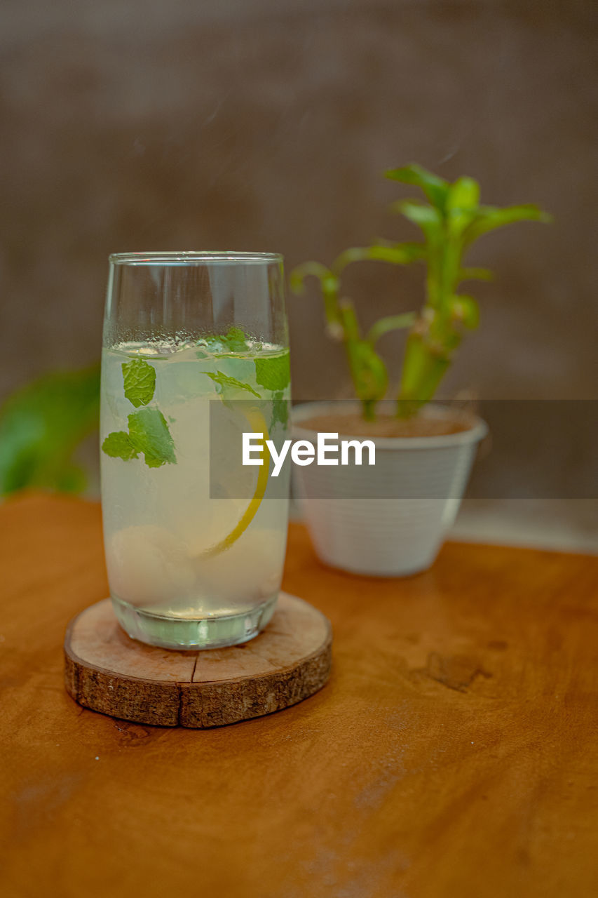Close-up of drink served on table