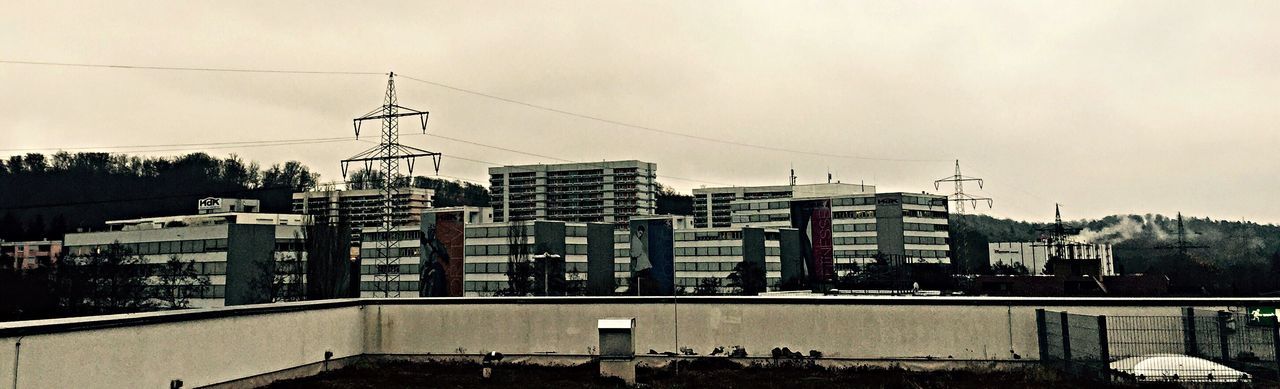 CITY BUILDINGS AGAINST SKY