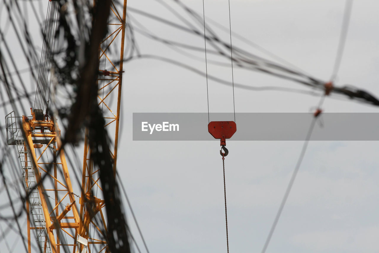 sky, nature, no people, mast, cable, electricity, day, low angle view, red, outdoors, line, hanging, vehicle, transportation, architecture, overhead power line, wire