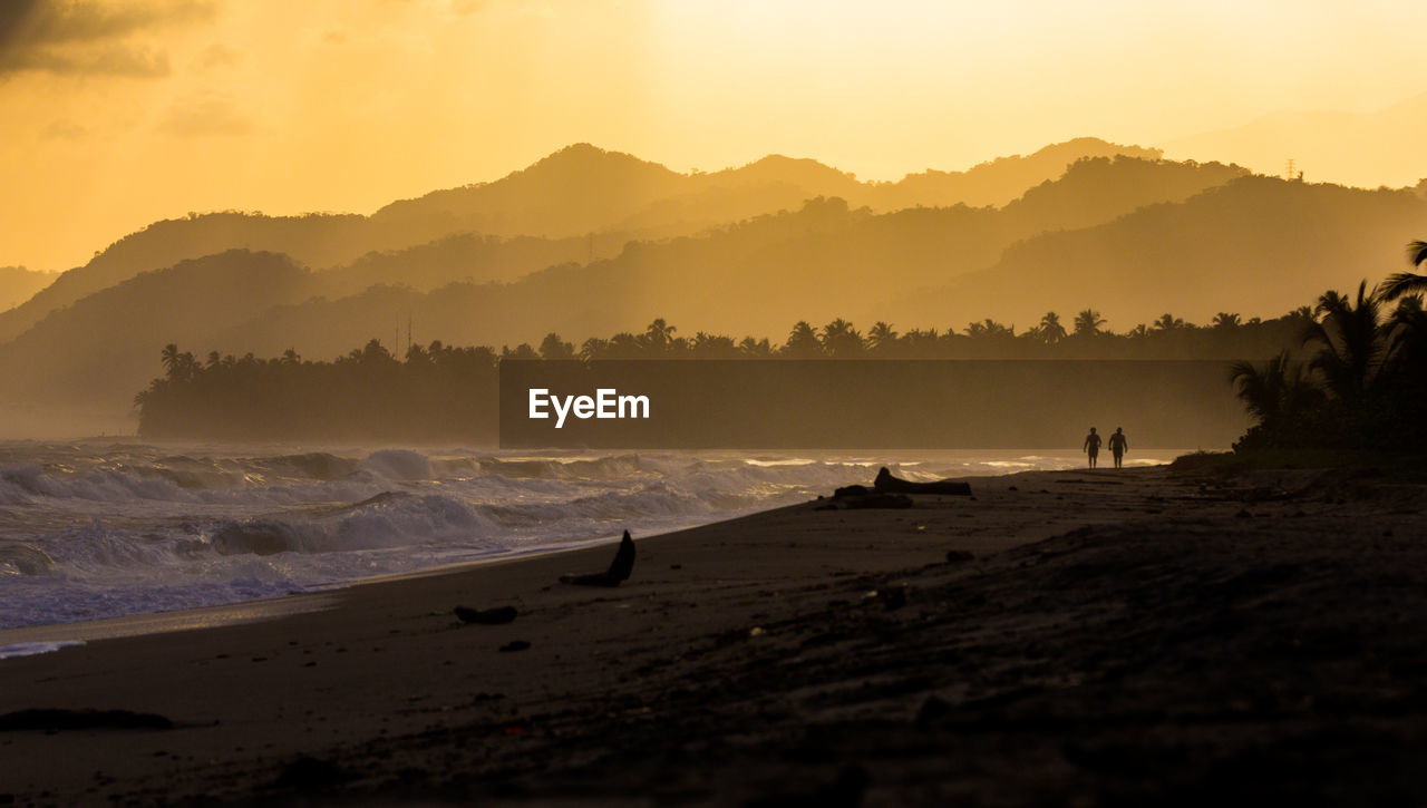 Scenic view of sunset over sea