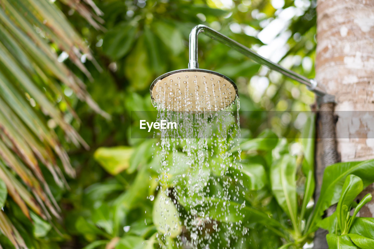 Low angle view of shower head outdoors