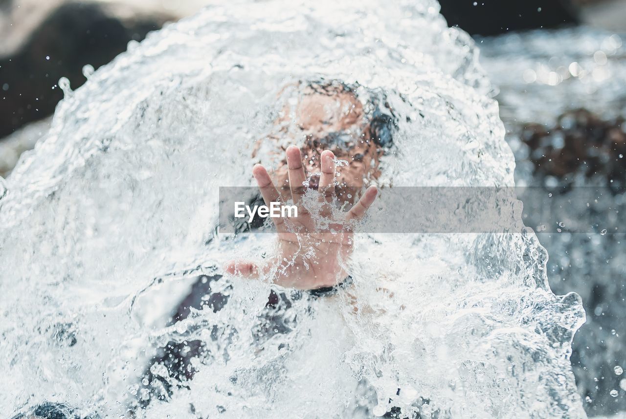 Man swimming in sea