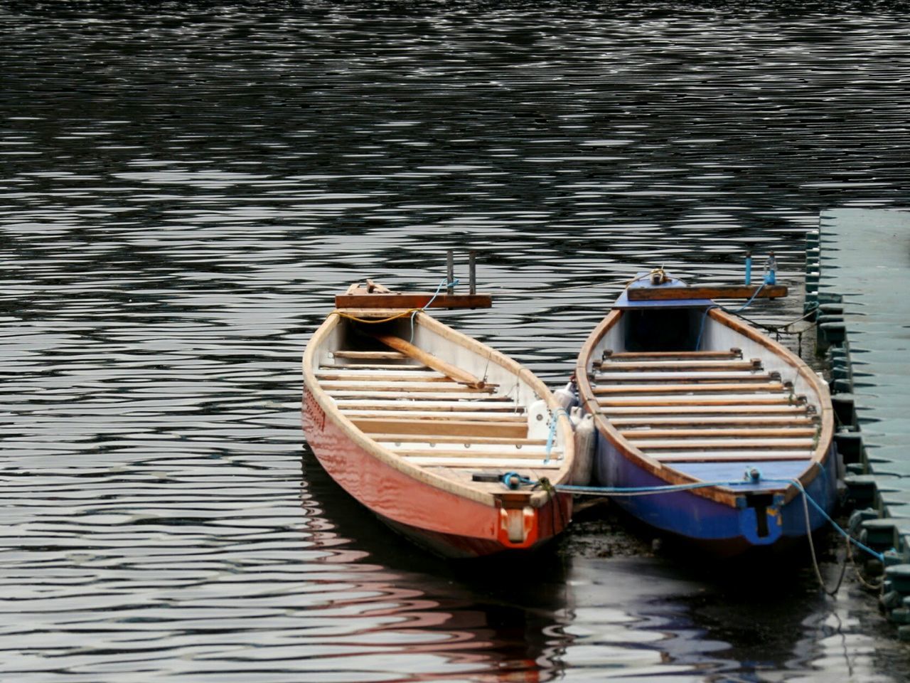 Boat moored in lake