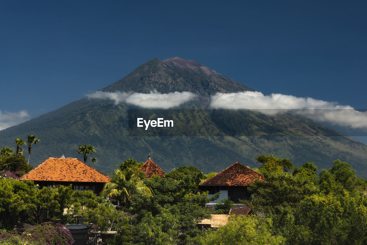 Peak of mount agung volcano above the amed village in karangasem, bali, indonesia