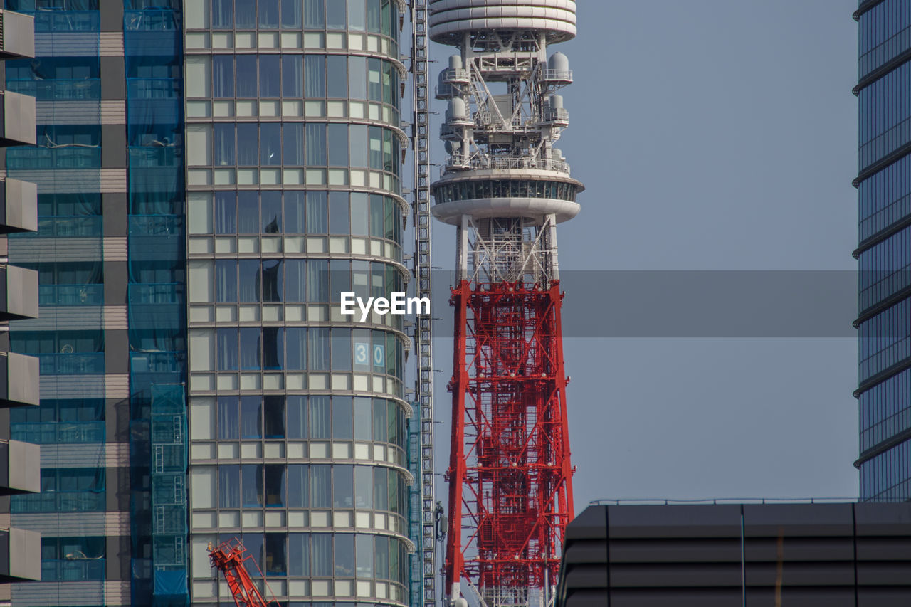 architecture, tower block, skyscraper, building exterior, built structure, tower, building, city, facade, office building exterior, industry, landmark, no people, low angle view, sky, nature, construction industry, day, outdoors, urban area, residential district, development, office, metropolis, business