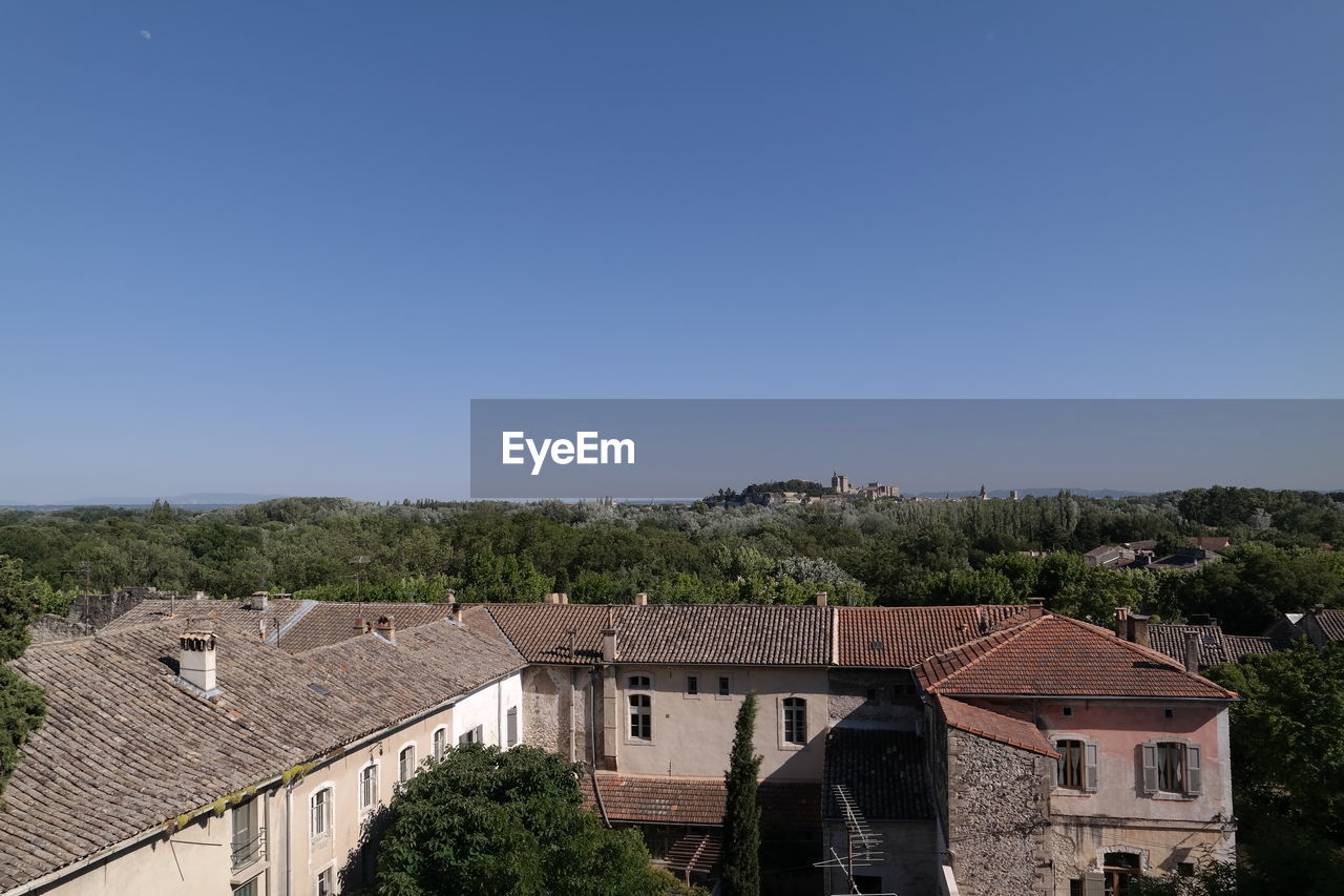 RESIDENTIAL BUILDINGS AGAINST BLUE SKY