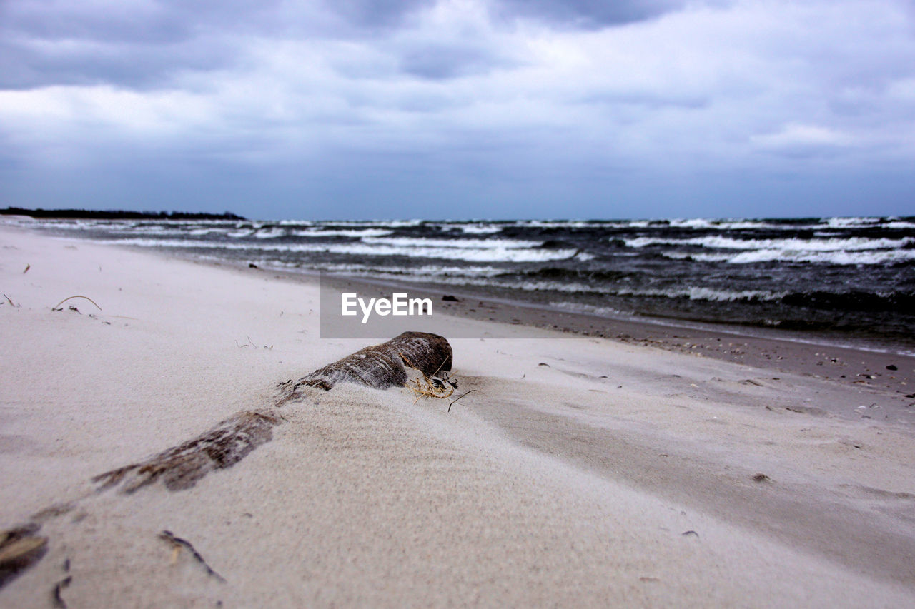 Scenic view of beach against sky