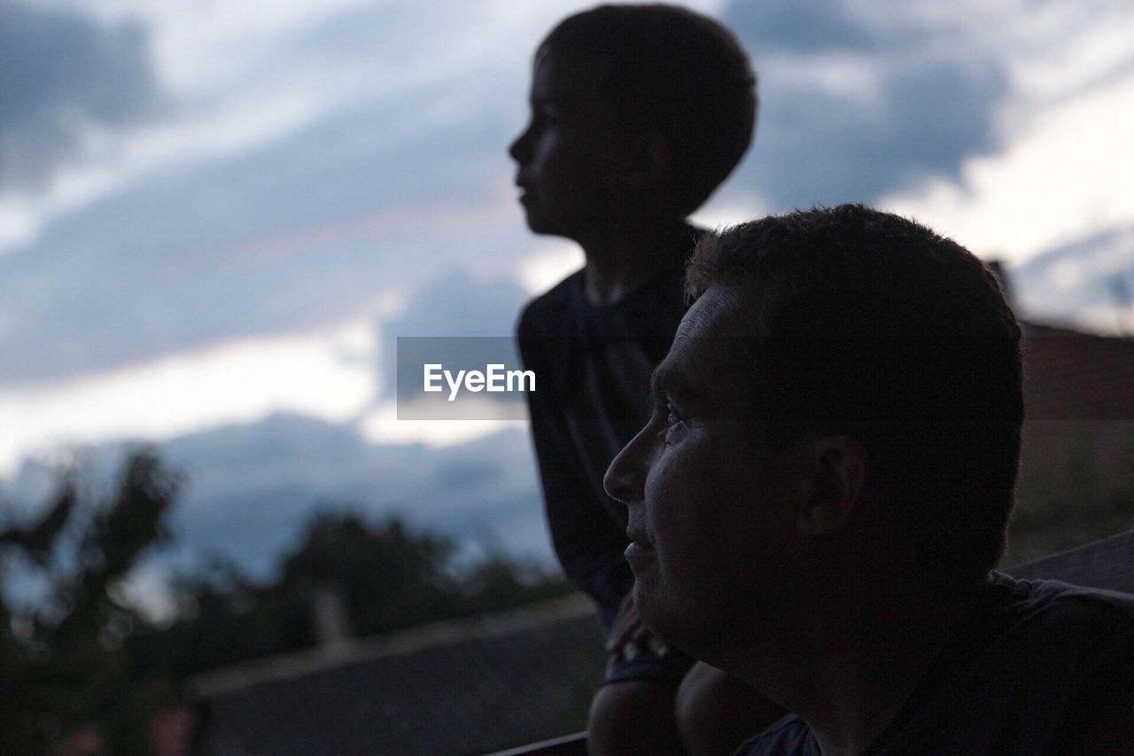 CLOSE-UP OF BOY LOOKING AT CAMERA