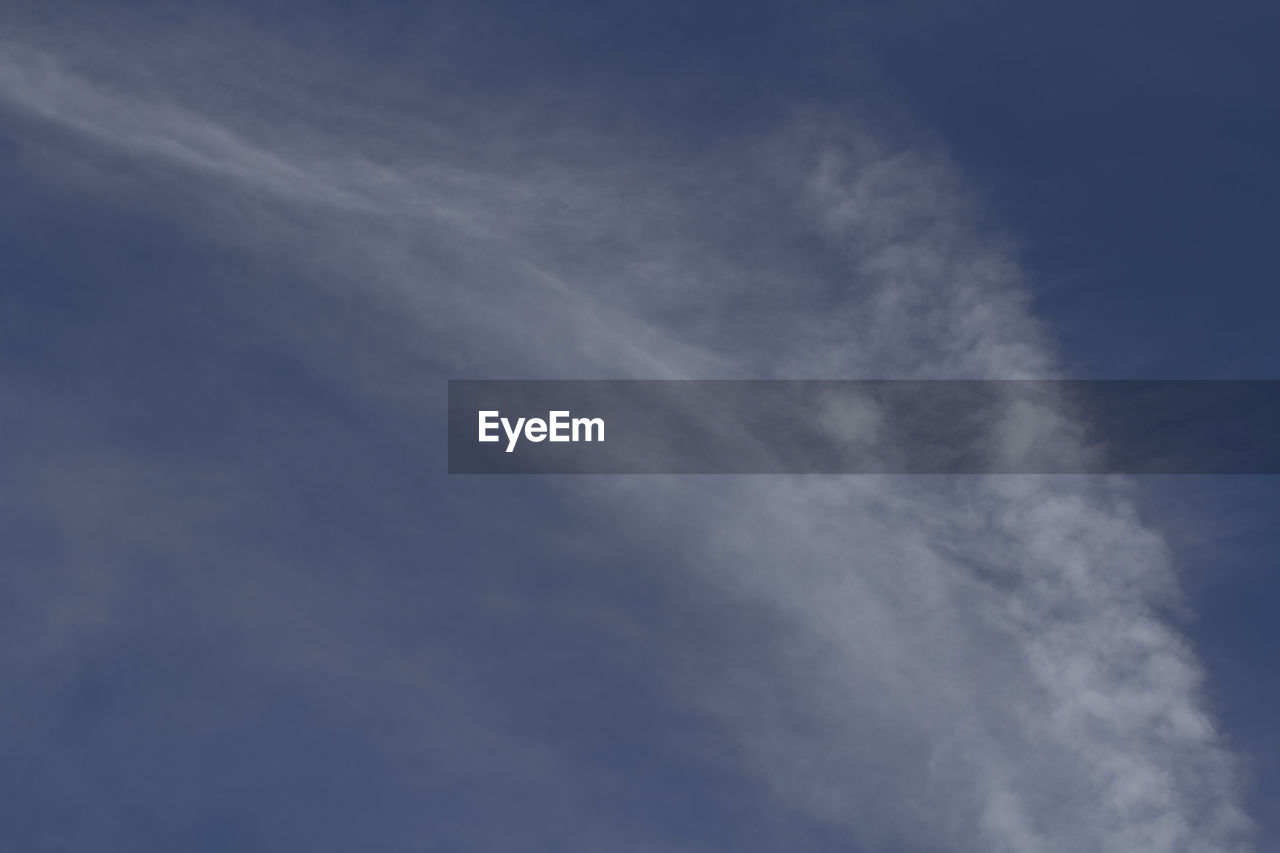 LOW ANGLE VIEW OF CLOUDS IN BLUE SKY
